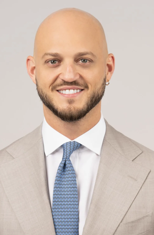 Portrait of Nile Lundgren, Licensed Associate Real Estate Broker.